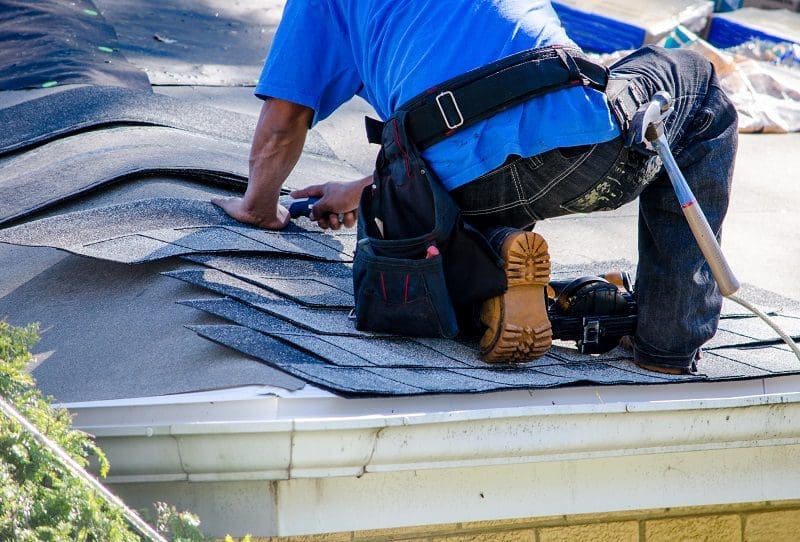 Replacing damaged shingles for roof repair