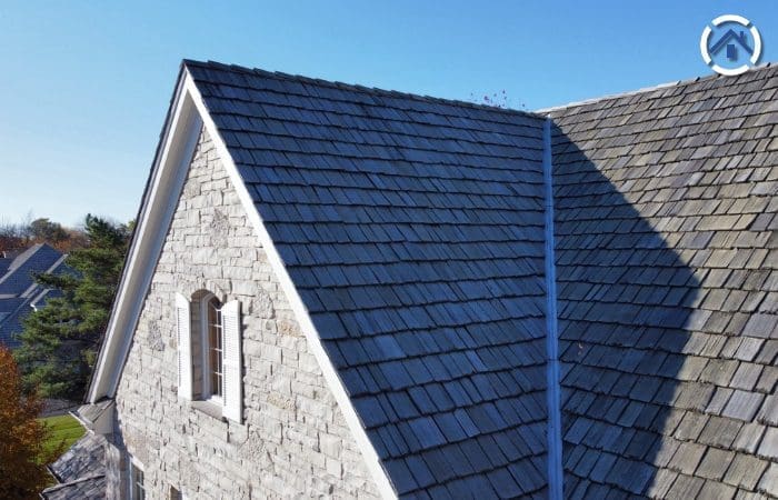 A steep cedar shake roof
